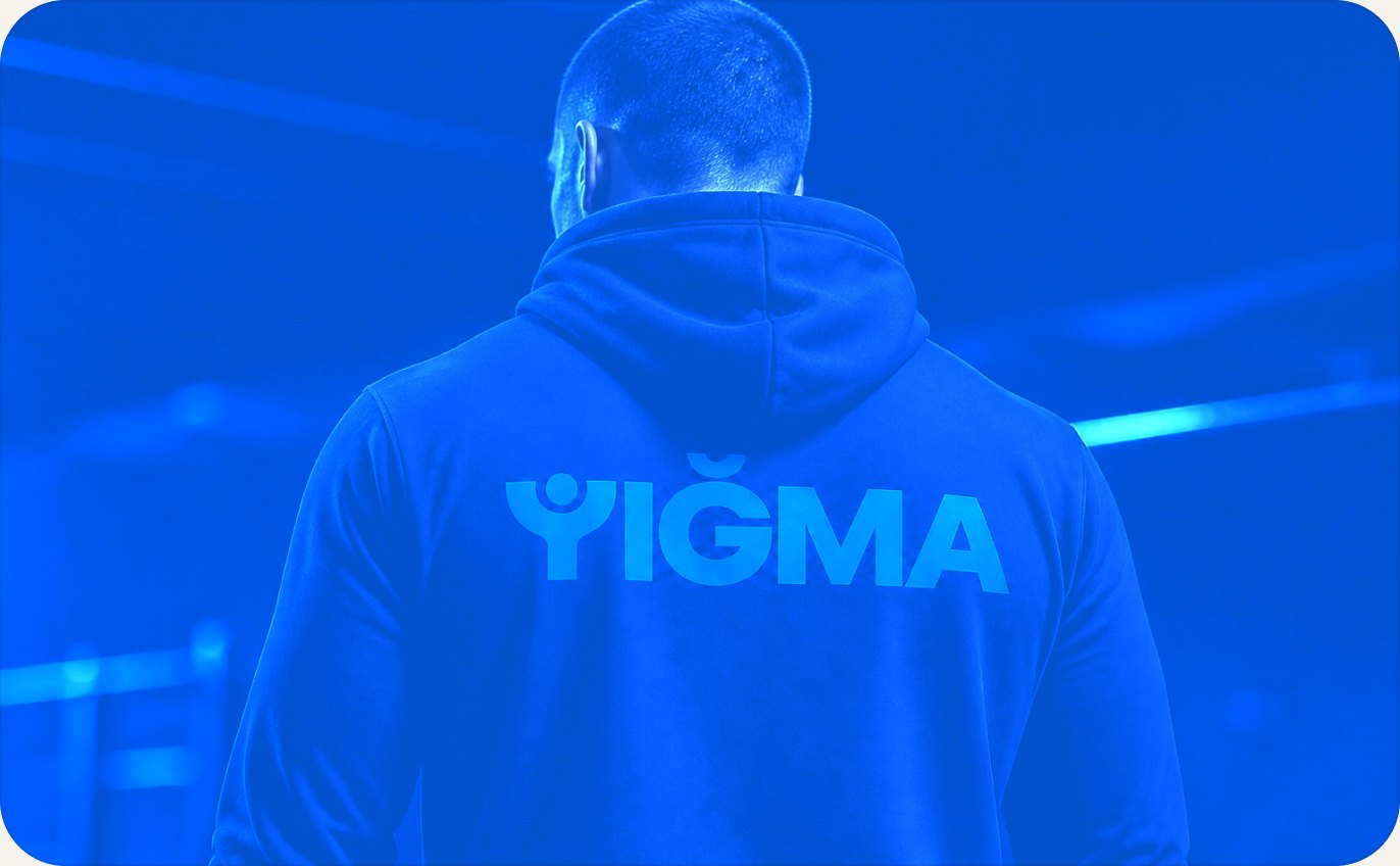 YIĞMA hoodie, back view, lit blue